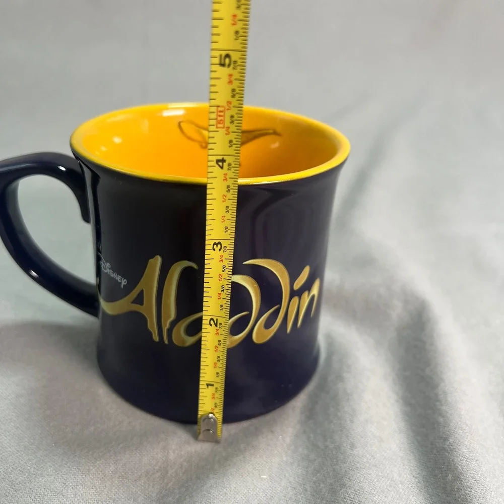 Disney Aladdin Broadway Musical‎ Coffee Mug Purple Yellow Genie Lamp Inside